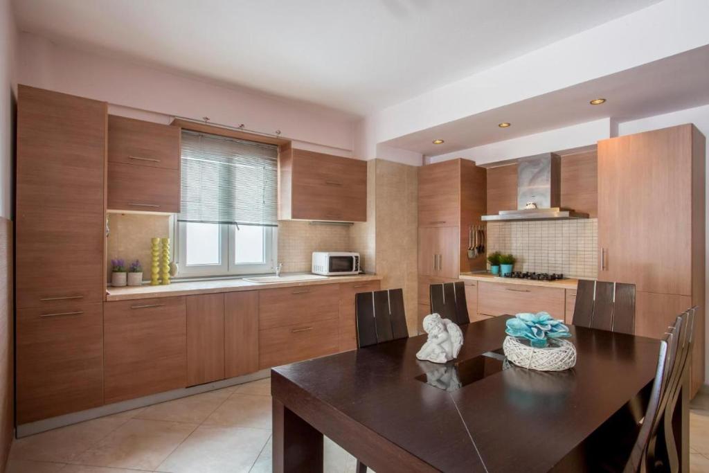 Kuchyňa alebo kuchynka v ubytovaní Sea la vie Apartment