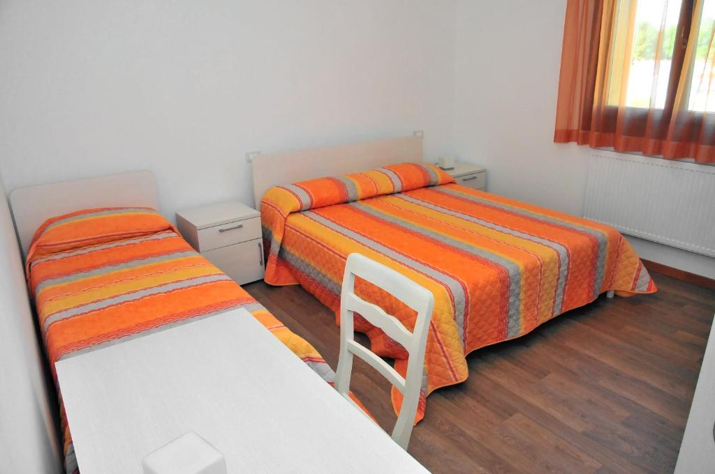 Postel nebo postele na pokoji v ubytování Albergo Diffuso Magredi