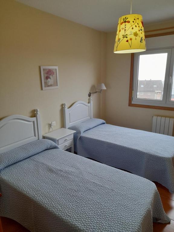Postel nebo postele na pokoji v ubytování APARTAMENTO VISTAS MAR