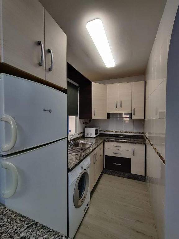 Kuchyň nebo kuchyňský kout v ubytování Precioso apartamento con piscina cerca de la playa TORROX COSTA