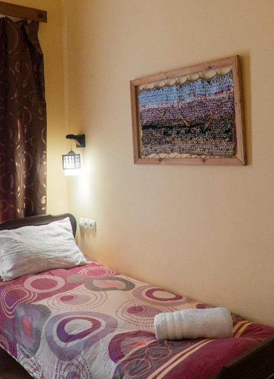 Postel nebo postele na pokoji v ubytování Telavi Tel Aviv