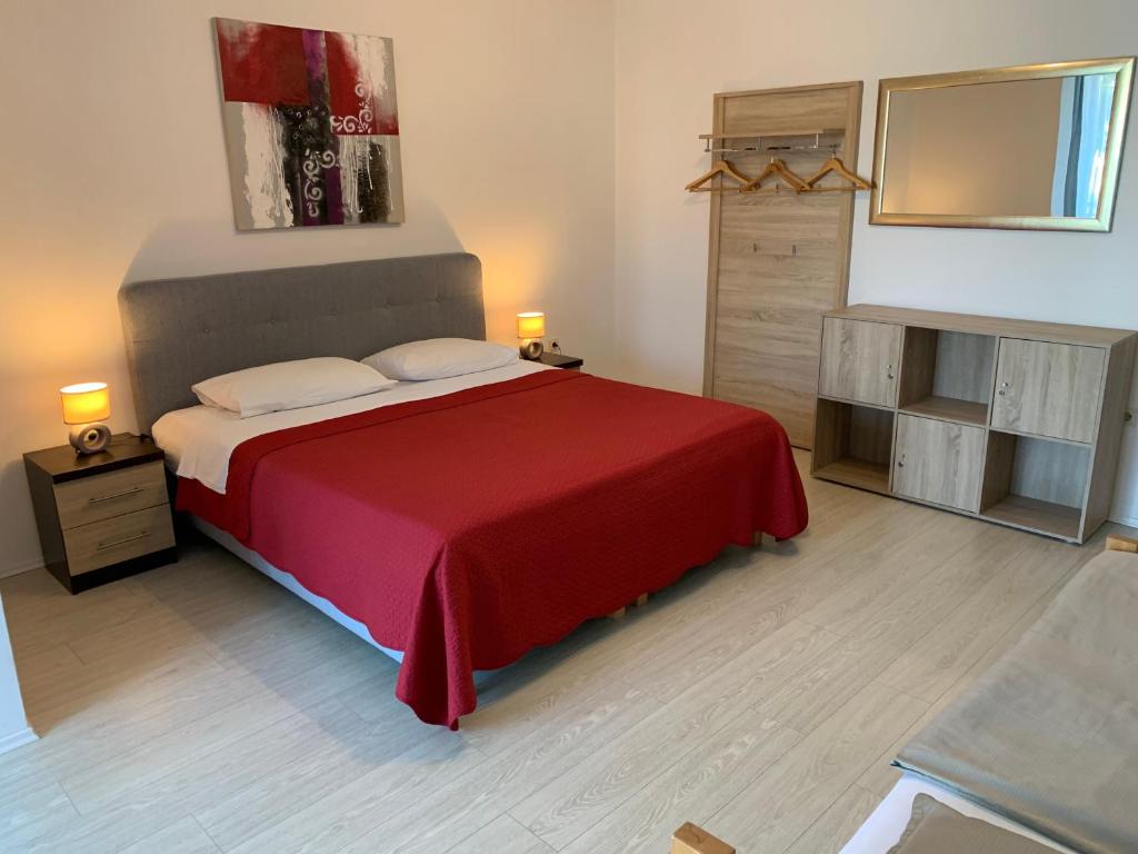 Łóżko lub łóżka w pokoju w obiekcie Apartments Vitez