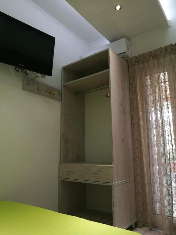 TV a/nebo společenská místnost v ubytování small booking room