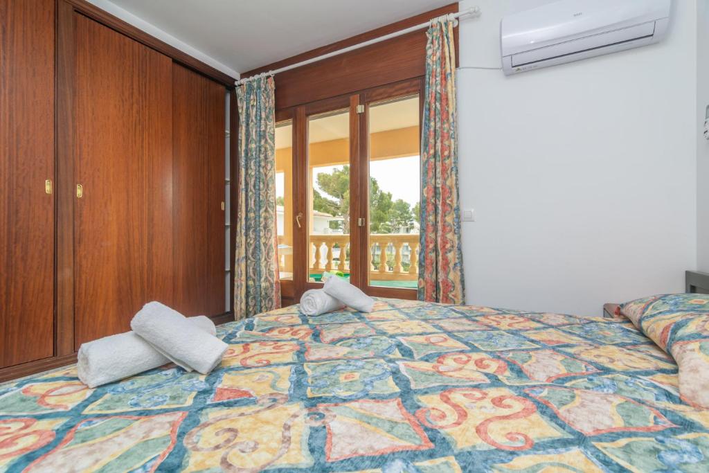 Postel nebo postele na pokoji v ubytování Casa Manolo