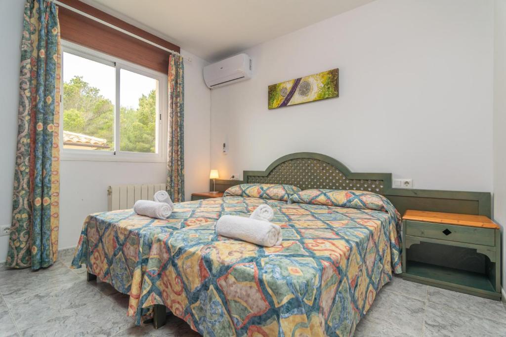 Postel nebo postele na pokoji v ubytování Casa Manolo