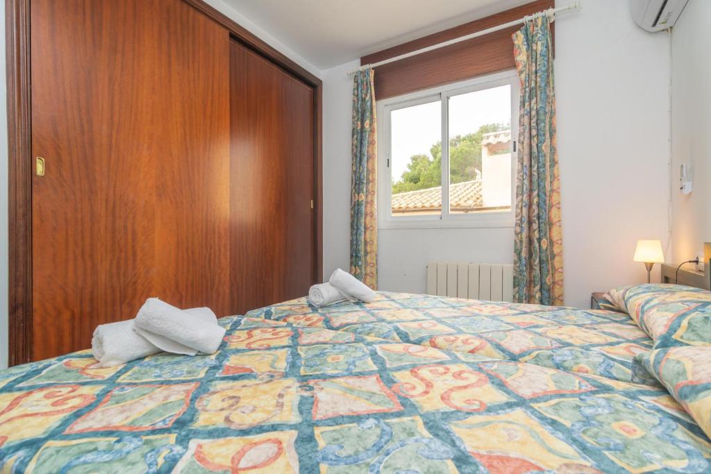 Postel nebo postele na pokoji v ubytování Casa Manolo