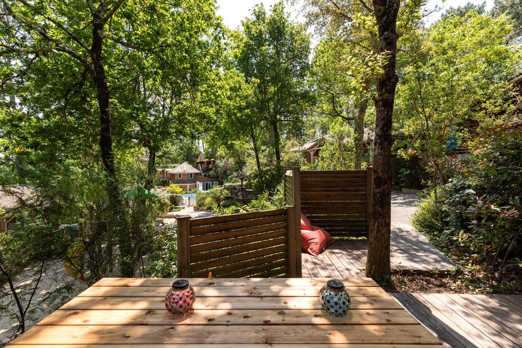 Zahrada ubytování Village Nature et Océan à côté de la plage avec piscine et jacuzzi