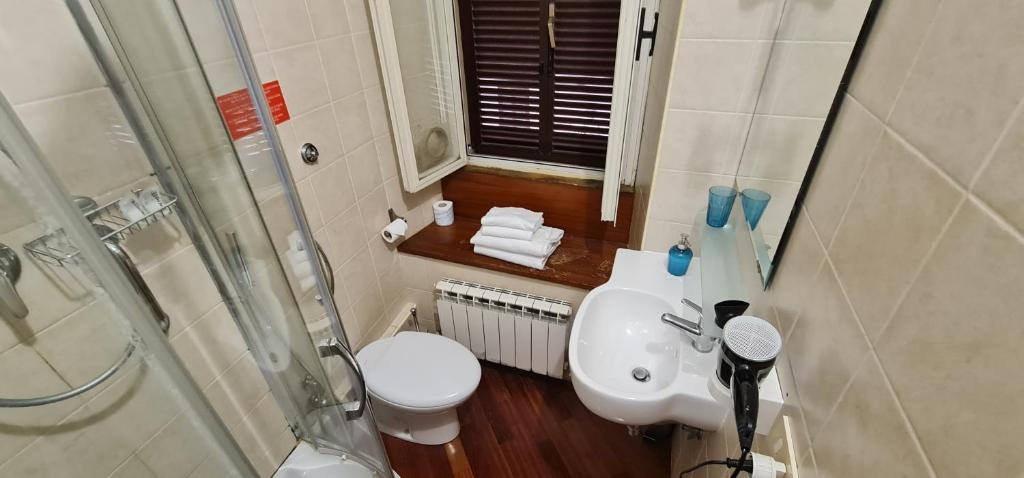 Koupelna v ubytování Hotel Martino Ai Monti