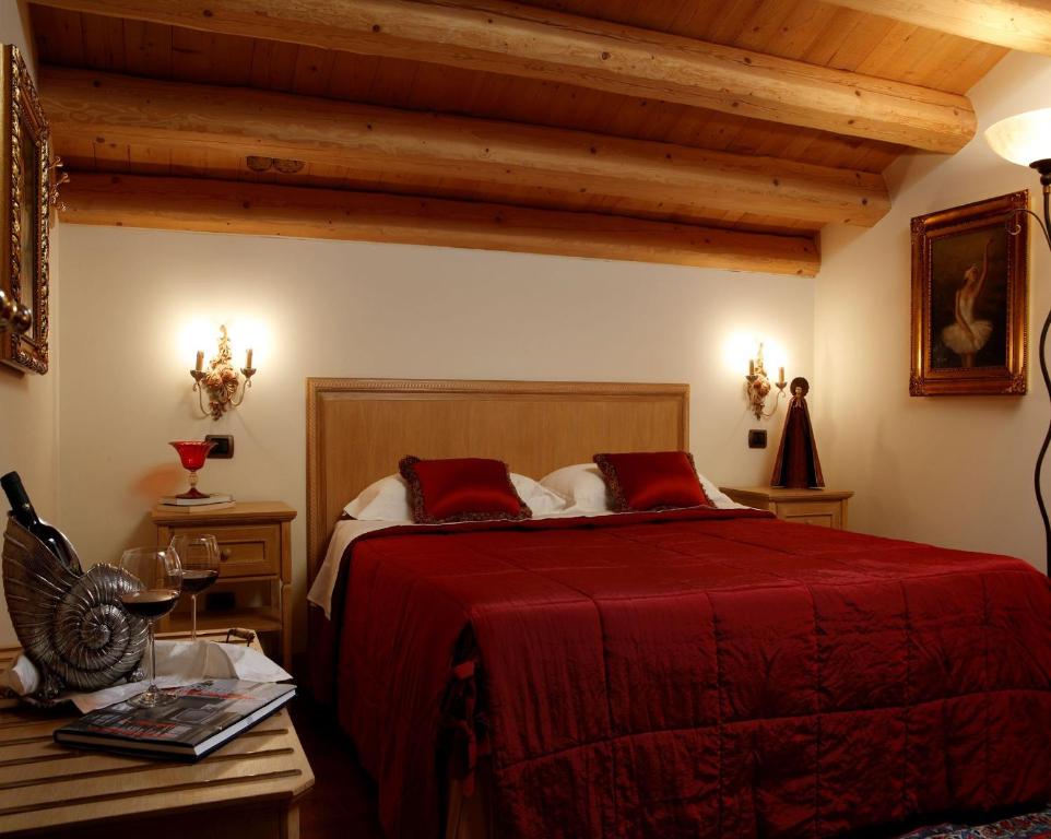 Postel nebo postele na pokoji v ubytování Agriturismo Villa Almè