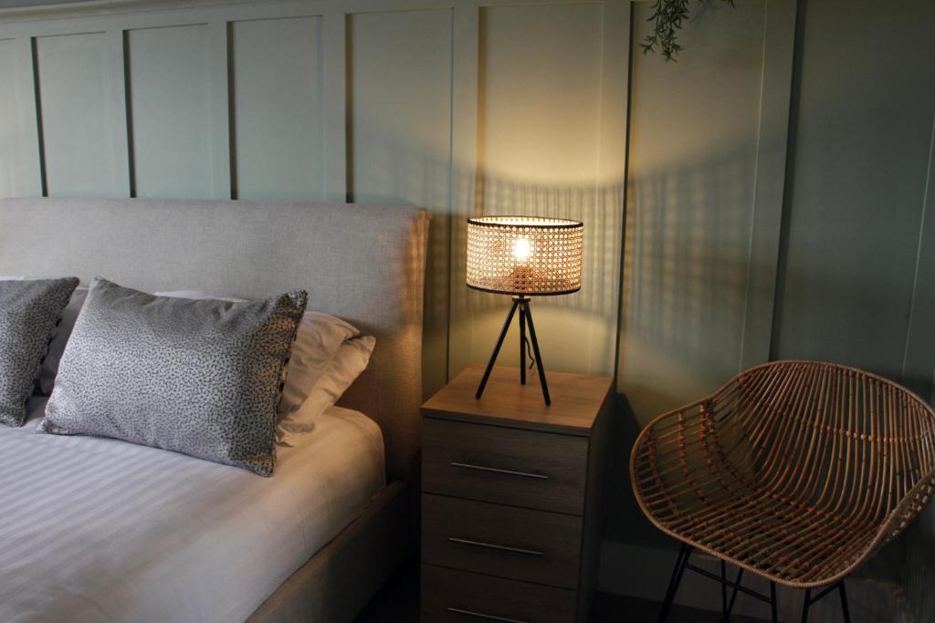 Postel nebo postele na pokoji v ubytování Heritage Serviced Suites - Serviced Apartments