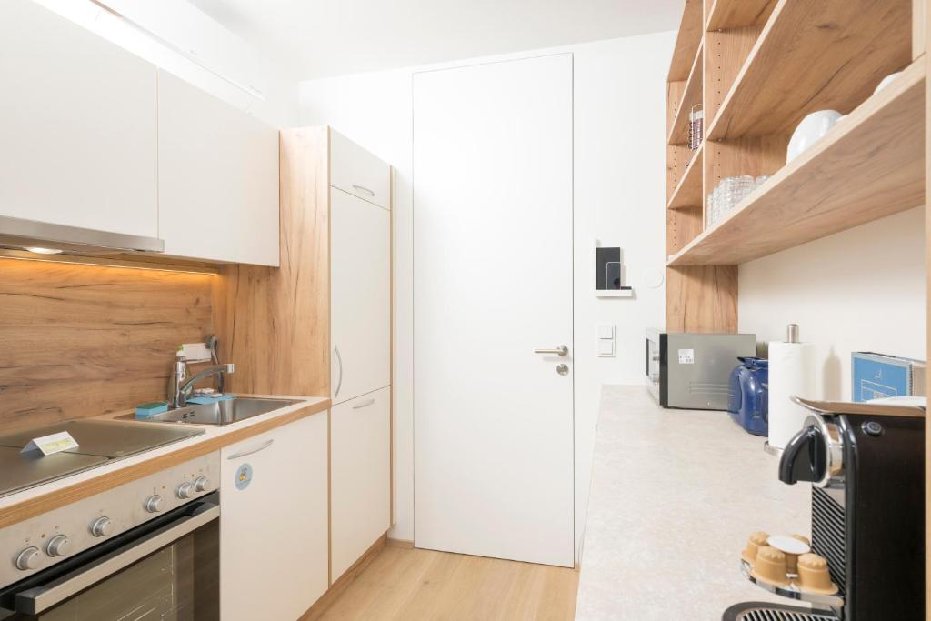 A kitchen or kitchenette at Cozy Ottakring