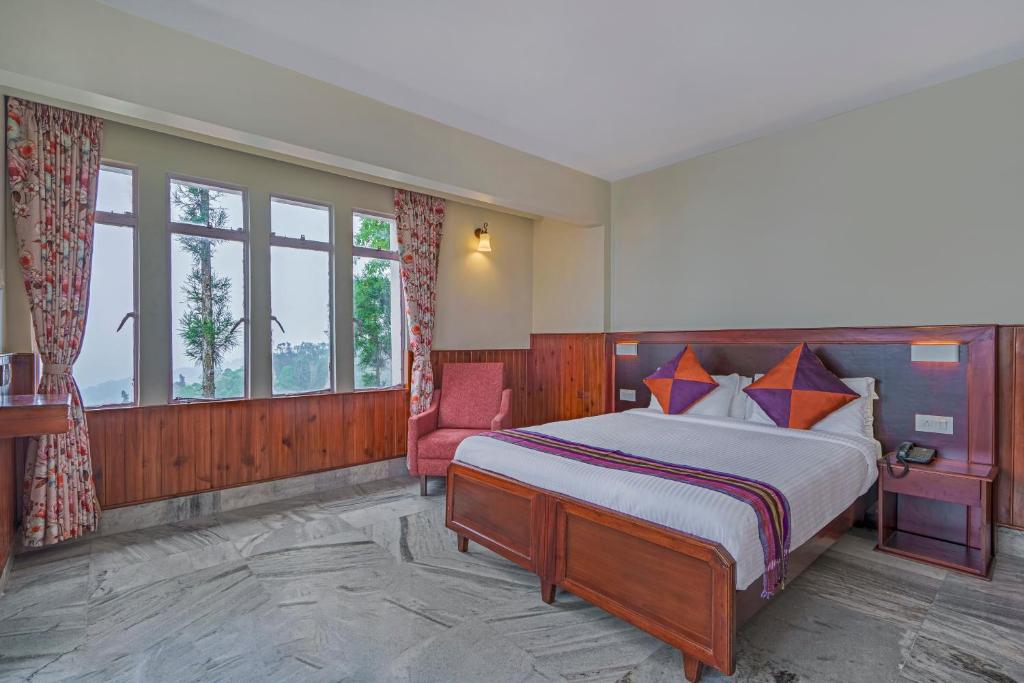 Postel nebo postele na pokoji v ubytování Sterling Park Kalimpong