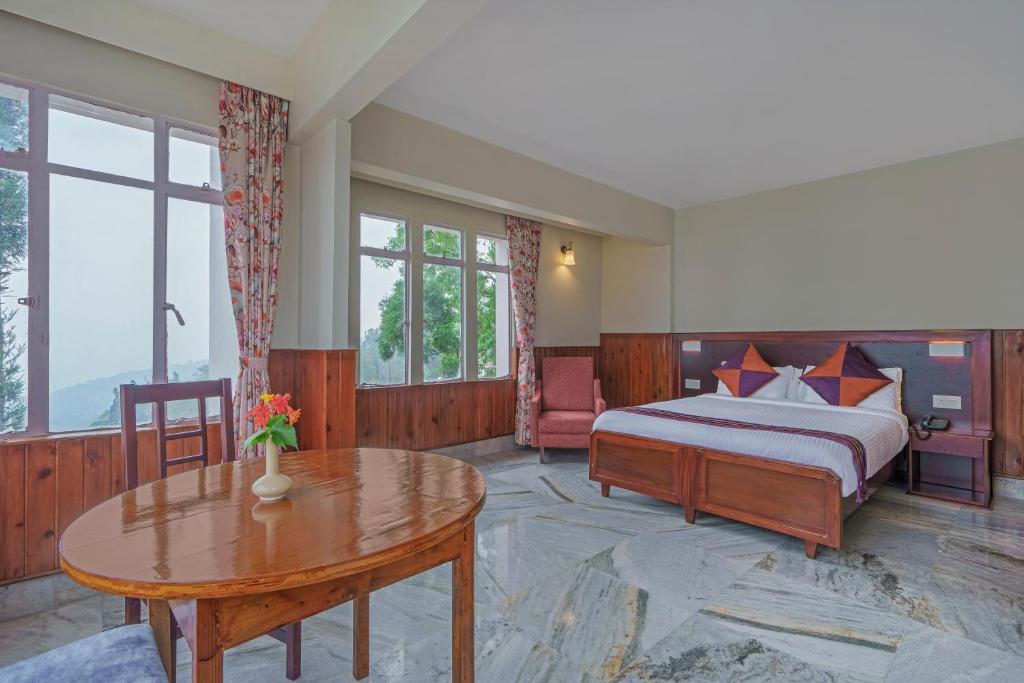 Postel nebo postele na pokoji v ubytování Sterling Park Kalimpong
