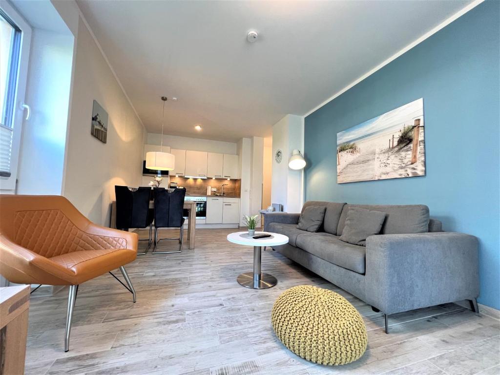 Posezení v ubytování Nordsee Park Dangast Haus 6 Whg. 2 Strandläufer