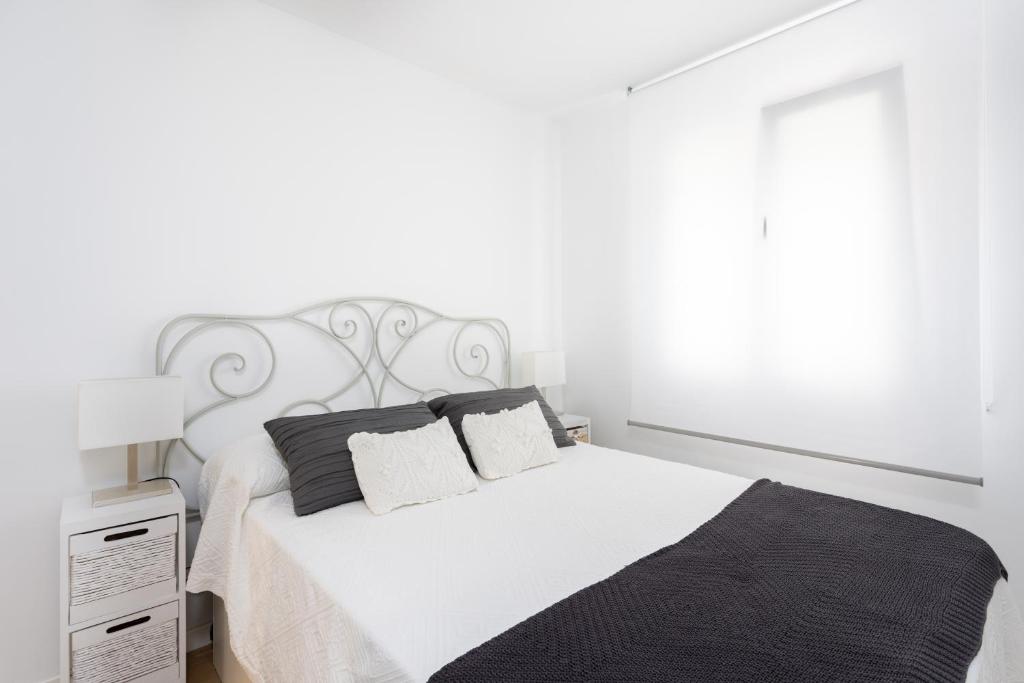 Postel nebo postele na pokoji v ubytování Home2Book Elegance City Center Apartment