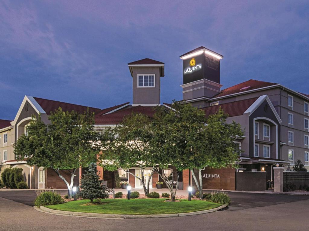 a rendering of the front of a hotel at La Quinta by Wyndham Denver Airport DIA in Denver