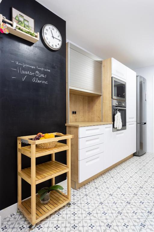 Kuchyň nebo kuchyňský kout v ubytování Home2Book Elegance City Center Apartment