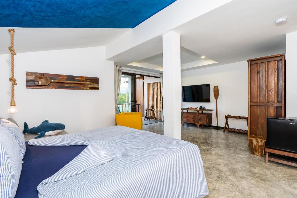 TV a/nebo společenská místnost v ubytování Shambhala Beach Resort