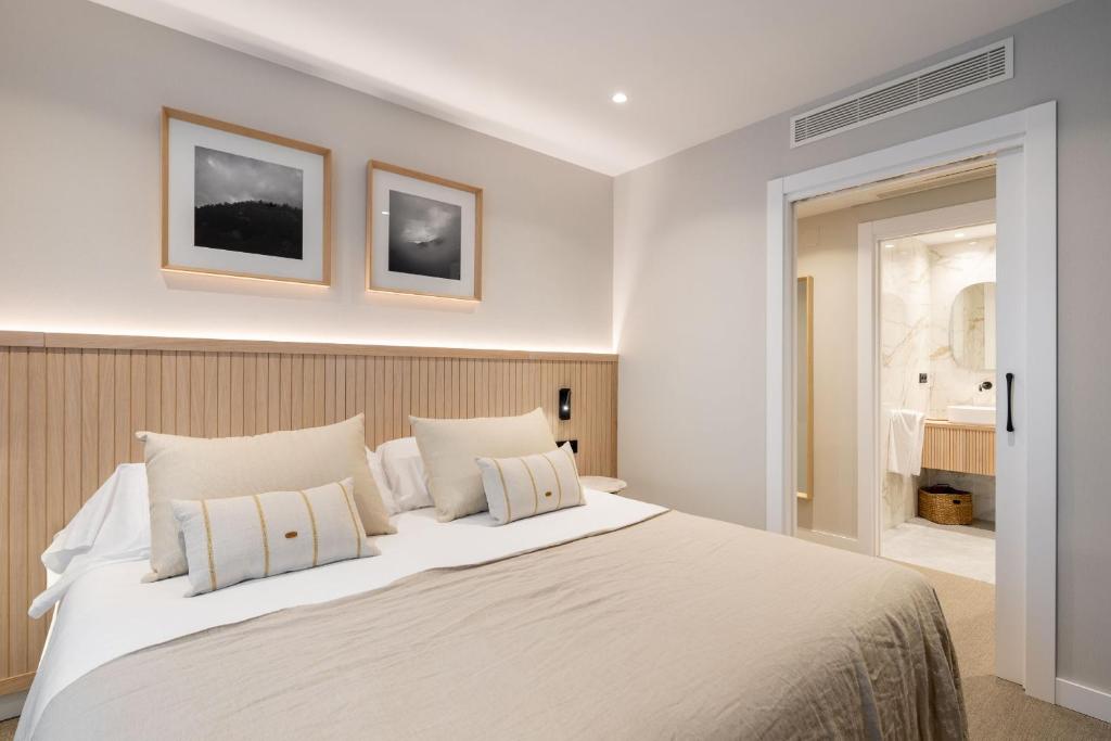 Postel nebo postele na pokoji v ubytování NIREA HOTEL
