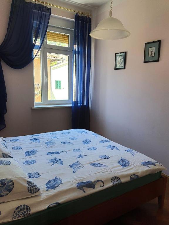 Postel nebo postele na pokoji v ubytování Family apartment Center
