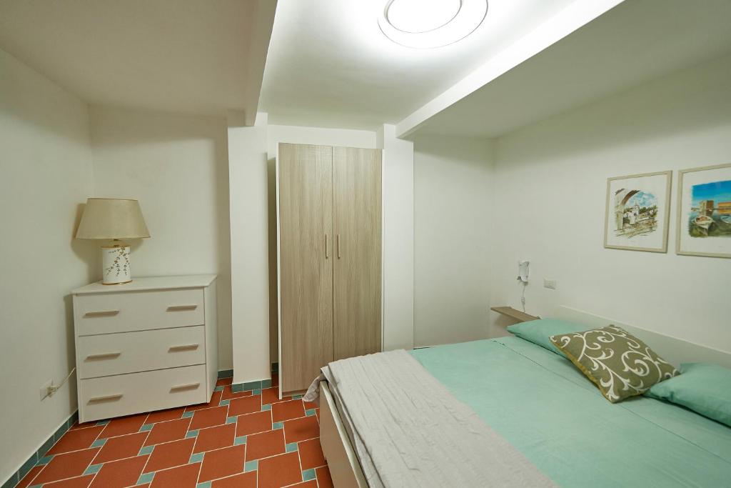 Posteľ alebo postele v izbe v ubytovaní A casa di Emma