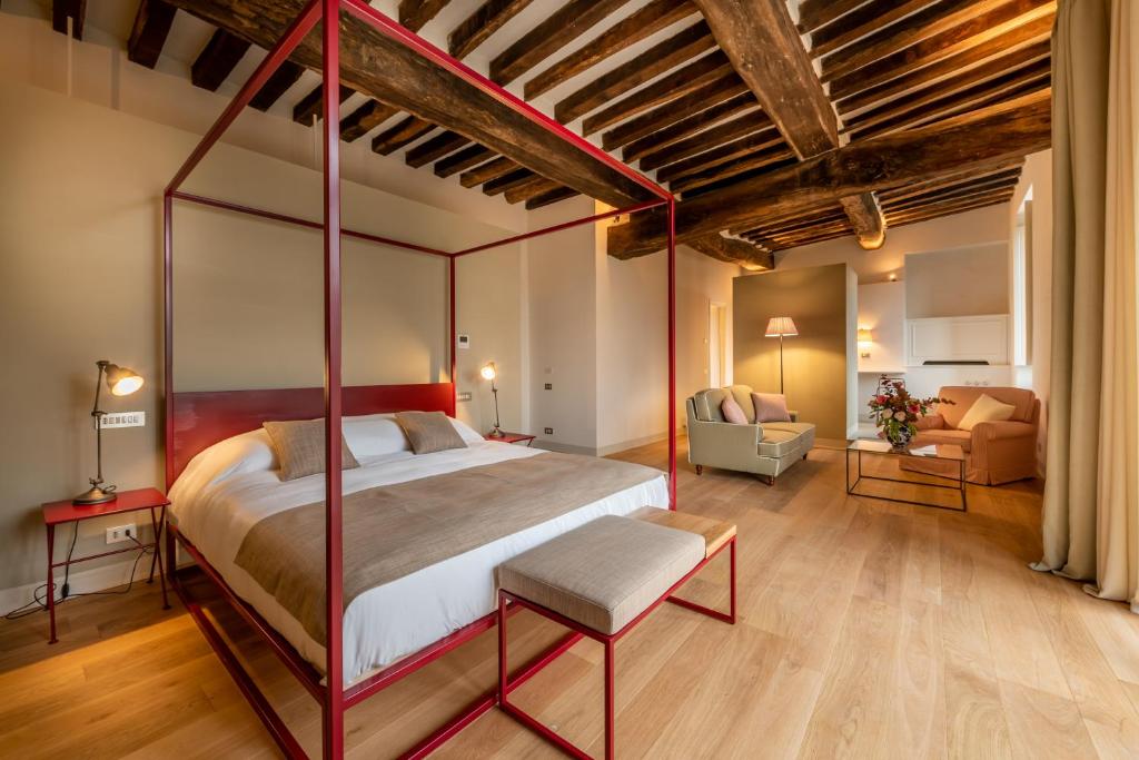 En eller flere senge i et værelse på Il Casale Denari