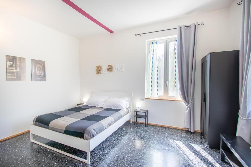 Televízia a/alebo spoločenská miestnosť v ubytovaní MAISON44