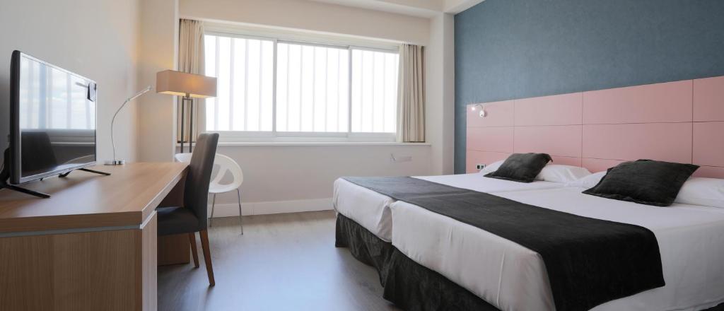 TV a/nebo společenská místnost v ubytování Hotel Chamartin The One