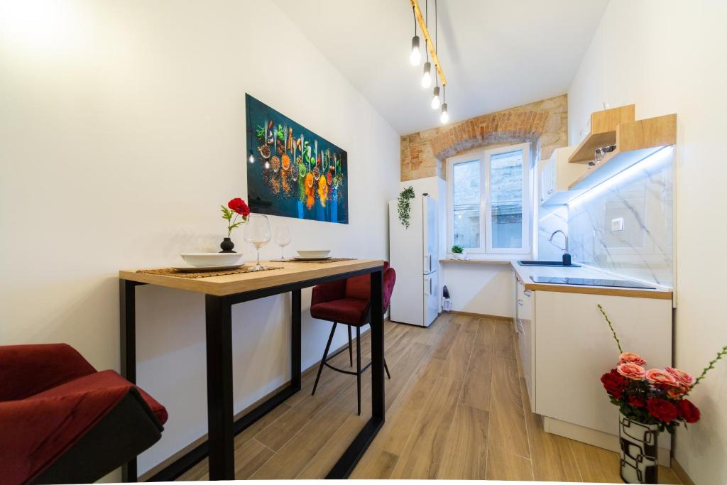 Kuchyň nebo kuchyňský kout v ubytování Apartman Kolura Vis
