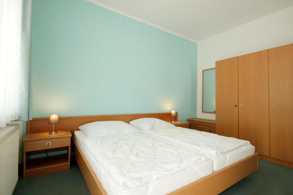 Postel nebo postele na pokoji v ubytování Villa Hans by Rujana