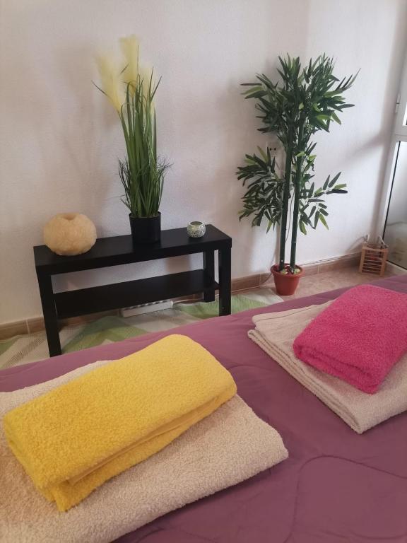 Postel nebo postele na pokoji v ubytování Apartament puerto