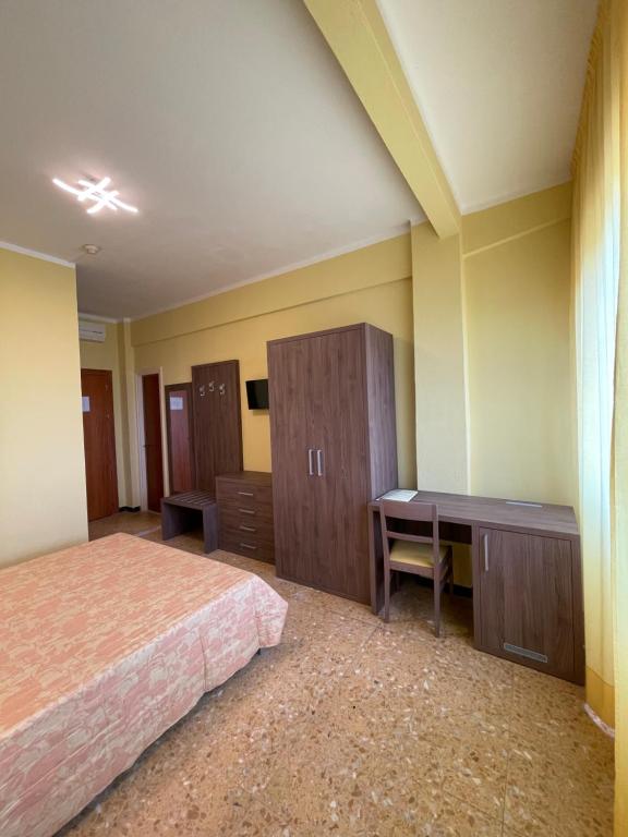 Postel nebo postele na pokoji v ubytování Hotel Robinia