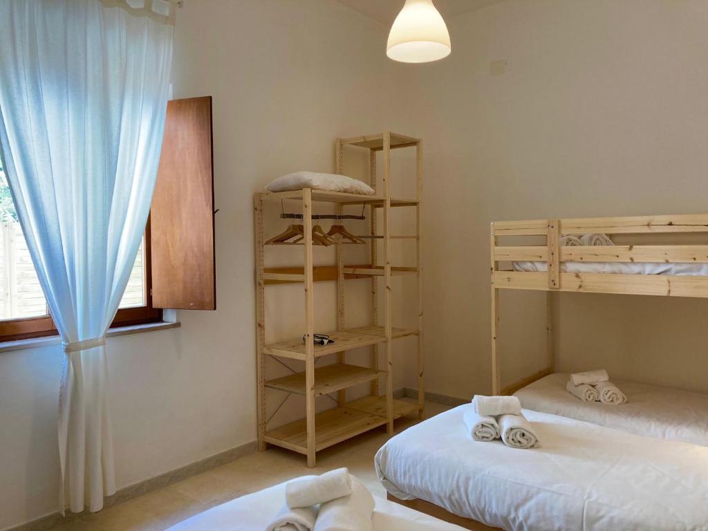 Postel nebo postele na pokoji v ubytování Dimore Montane