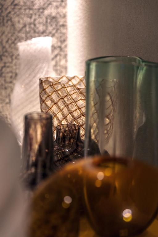 a close up of a glass of wine on a table at Hotel Dei Dragomanni in Venice