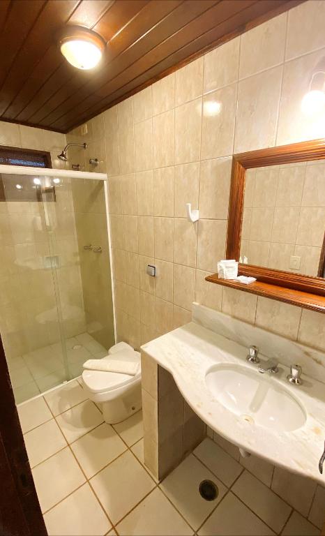 Um banheiro em HOTELARE Hotel Brunello