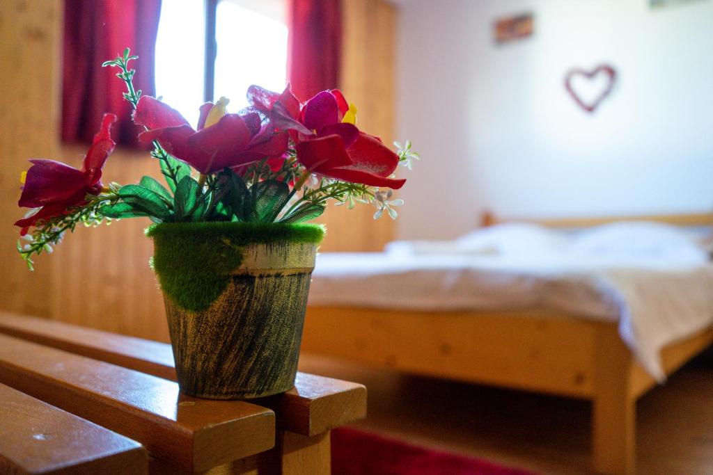 Postel nebo postele na pokoji v ubytování Casa Karol
