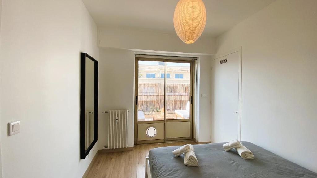 Posteľ alebo postele v izbe v ubytovaní T2 Bricka La Terrasse de la plage, Moderne, équipé, Lumineux