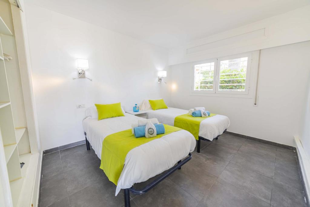 Posteľ alebo postele v izbe v ubytovaní Apartamento Beachfront Sonrisas