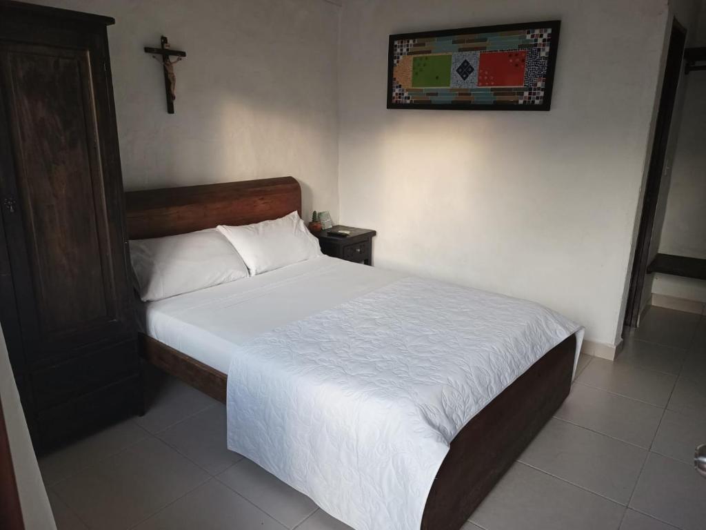 Postel nebo postele na pokoji v ubytování Hotel Villa Maritza