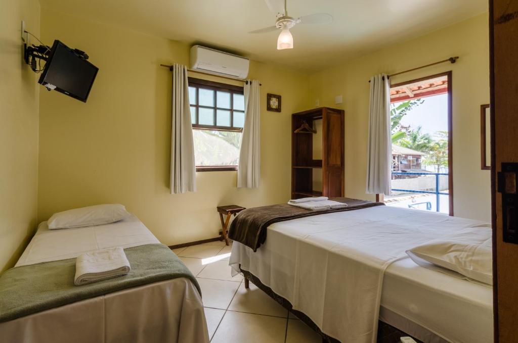 Cama ou camas em um quarto em HOTELARE Hotel Brunello
