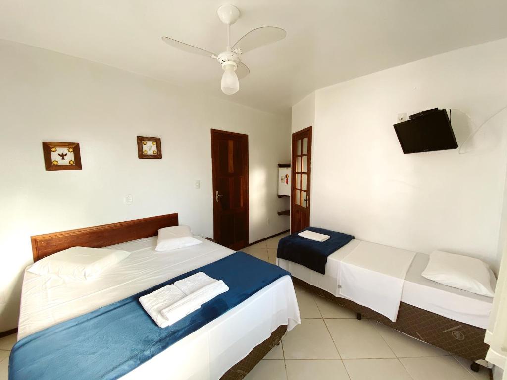 Cama ou camas em um quarto em HOTELARE Hotel Brunello