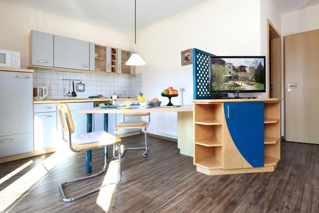 Kuchyň nebo kuchyňský kout v ubytování Parkhotel Flora