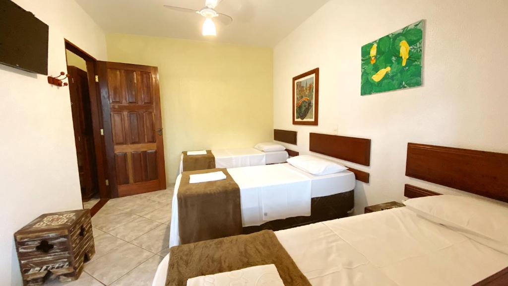 Cama ou camas em um quarto em HOTELARE Hotel Brunello
