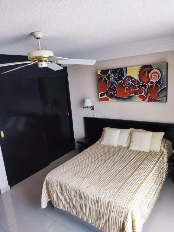 Postel nebo postele na pokoji v ubytování Hotel Mary Celaya
