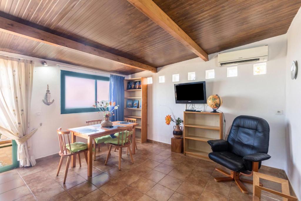 TV a/nebo společenská místnost v ubytování Apartamento B Armonia Rural