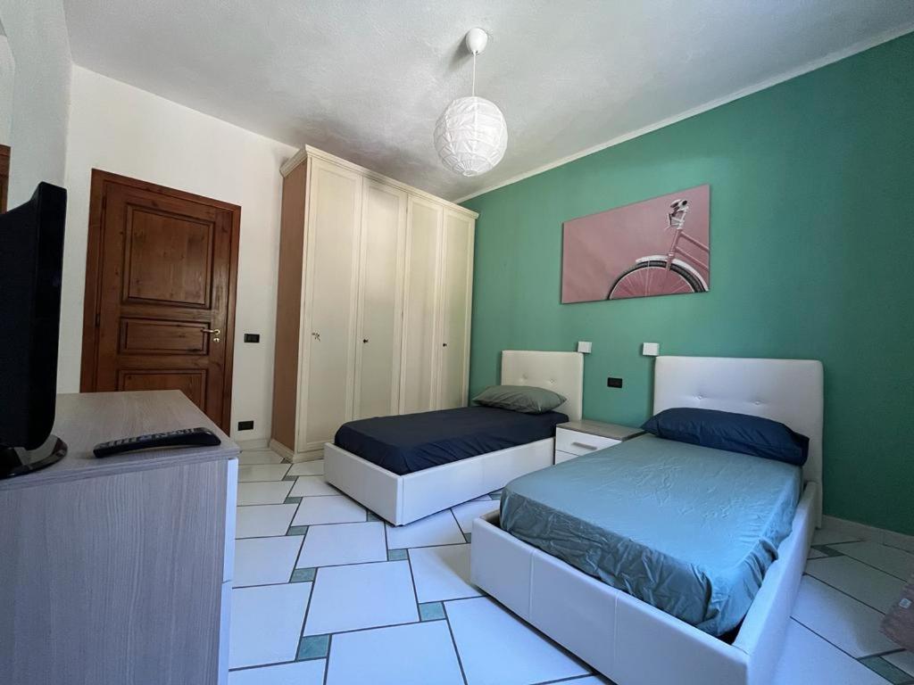 A bed or beds in a room at Casa Impagliazzo