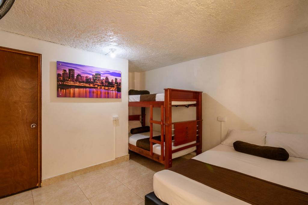 Postel nebo postele na pokoji v ubytování Hotel Sol del Estadio