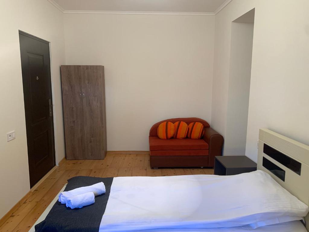 Postel nebo postele na pokoji v ubytování Hotel Lemi