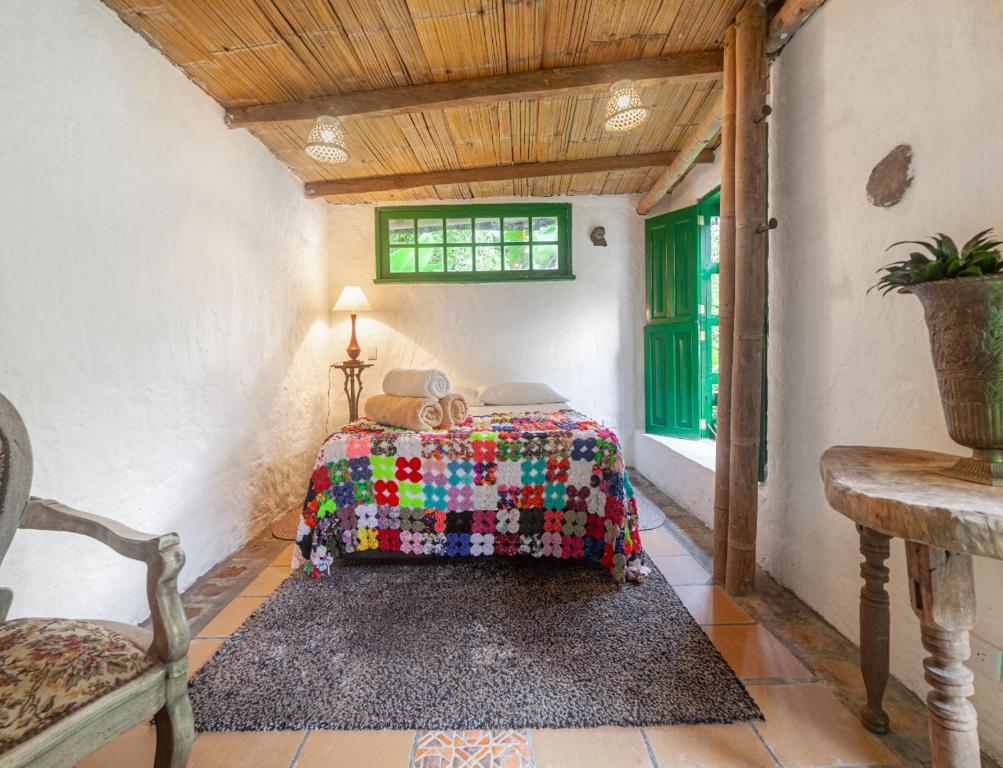 Postel nebo postele na pokoji v ubytování Finca Los Abuelos - La Planta