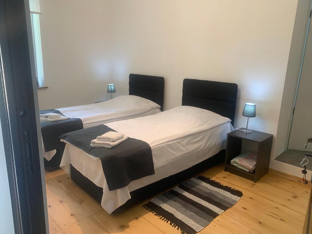 Postel nebo postele na pokoji v ubytování Hotel Lemi